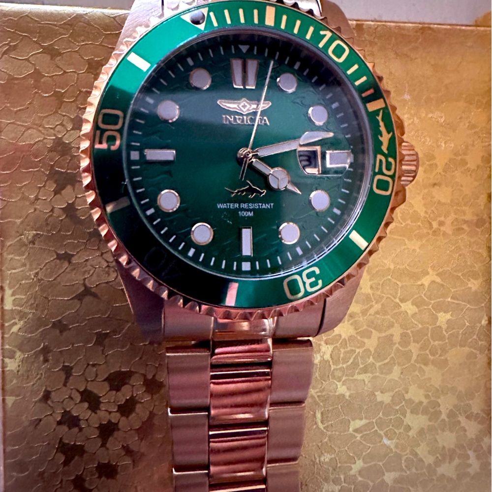 Invicta watch gold and green